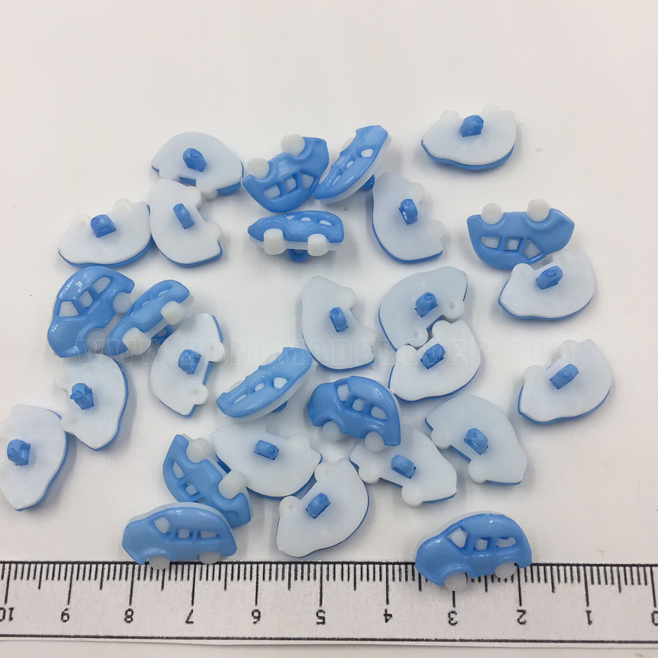 กระดุมพลาสติก รูปรถเต่า สีฟ้า ขนาด 12*18 mm. (แพ็ค 10 ชิ้น)