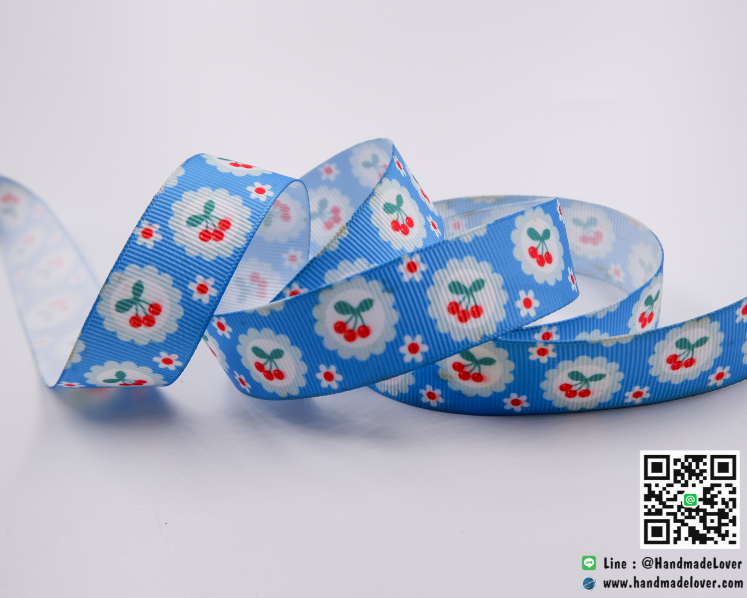 ริบบิ้นผ้า กรอสเกรน สีฟ้า พิมพิ์ลายเชอรี่ ขนาด 22 มิล
