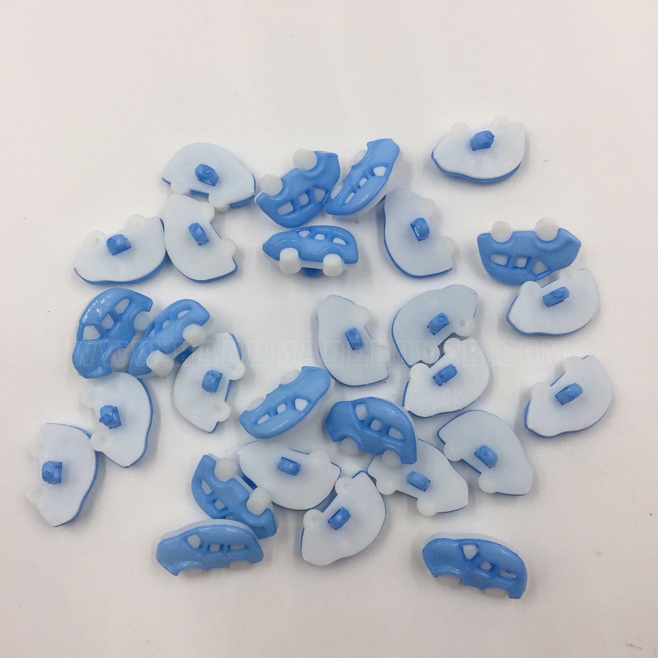 กระดุมพลาสติก รูปรถเต่า สีฟ้า ขนาด 12*18 mm. (แพ็ค 10 ชิ้น)