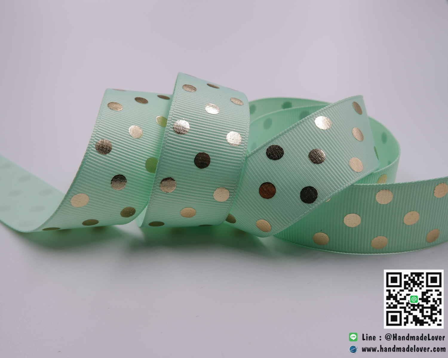 ริบบิ้นผ้า กรอสเกรน สีมิ้นท์ พิมพ์ลายจุดสีทองสะท้อนแสง ขนาด 25 มิล