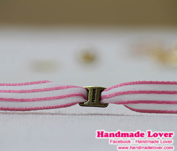 จี้,ตัวห้อยซิปหัวเข็มขัด