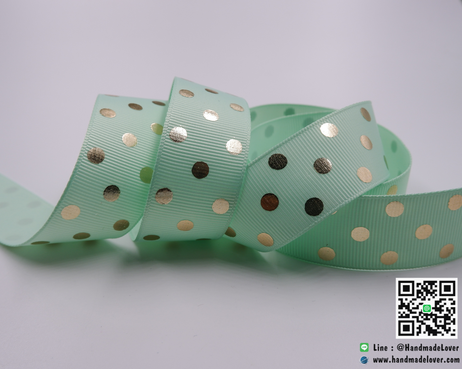 ริบบิ้นผ้า กรอสเกรน สีมิ้นท์ พิมพ์ลายจุดสีทองสะท้อนแสง ขนาด 25 มิล