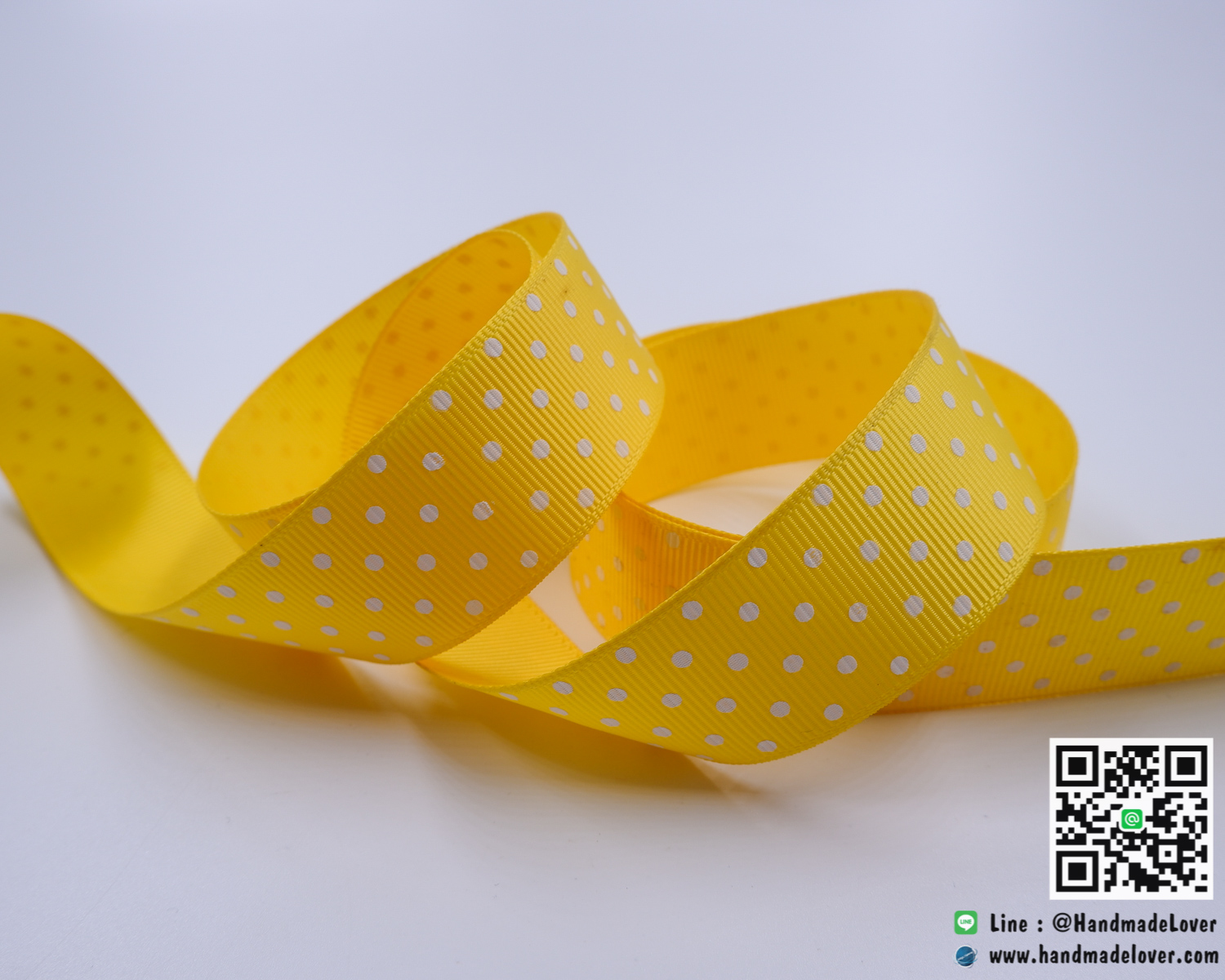 ริบบิ้นผ้าสีเหลือง พิมพิ์ลายจุด ขนาด กว้าง 25 mm.