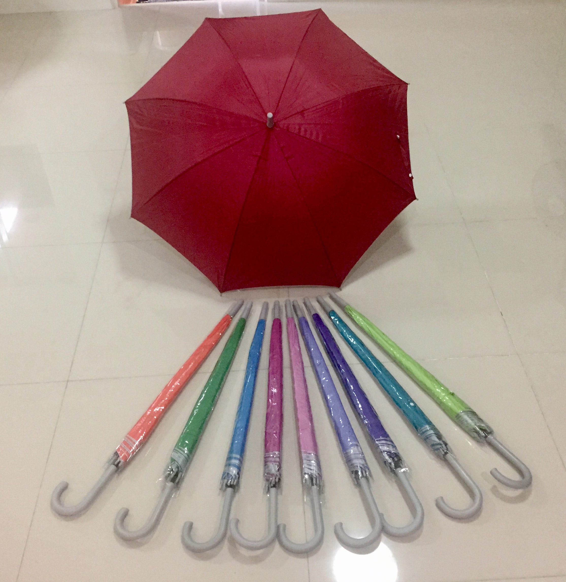 ร่ม22นิ้ว ออโต้เปิด ผ้าUV สีพื้น โครงโลหะ ปลอกPVC คละสี