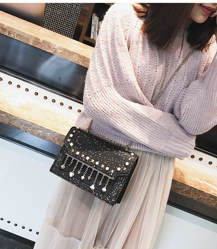 กระเป๋าแฟชั่น กริสเตอร์ วิ๊งสีดำ