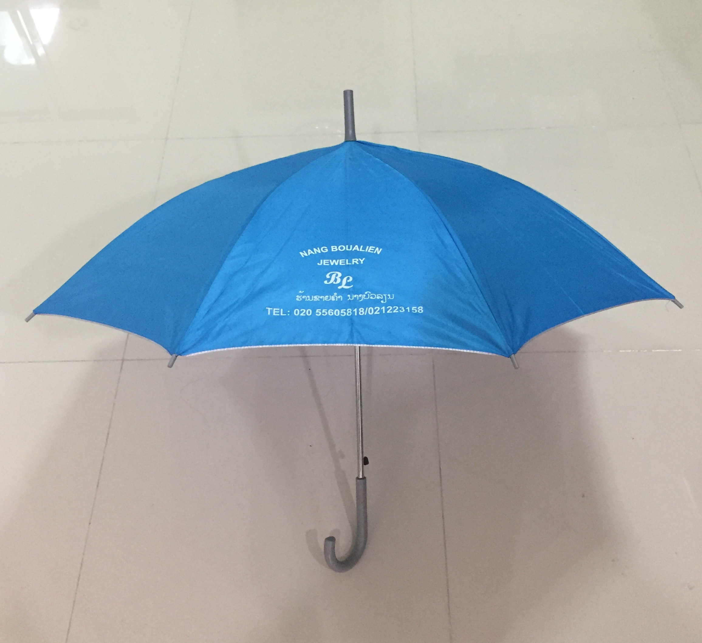 ร่มตอนเดียว 22 นิ้ว ผ้าUV สีฟ้า โครงโลหะ ออโต้เปิด ปลอกPVC สกรีนโลโก้