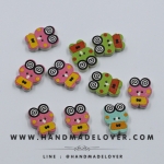 กระดุมไม้ กบเคโระ คละสี ขนาด 21*17 mm [แพ็ค 10 เม็ด]