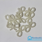 มุกตกแต่งรูปโบว์ สีมุก (แพ็ค 25 ชิ้น)