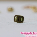 จี้,ตัวห้อยซิปหัวเข็มขัด