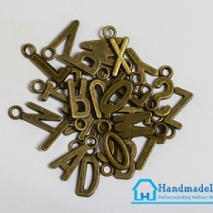 ตัวอักษรสีทองรมดำ